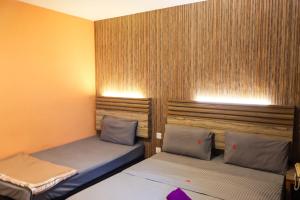 Postel nebo postele na pokoji v ubytování Classical Boutique Hotel