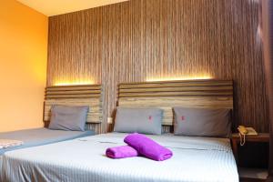 Postel nebo postele na pokoji v ubytování Classical Boutique Hotel