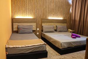 Postel nebo postele na pokoji v ubytování Classical Boutique Hotel