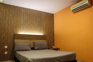Postel nebo postele na pokoji v ubytování Classical Boutique Hotel