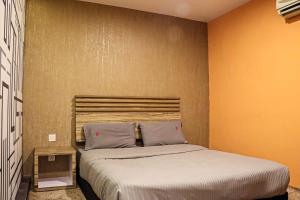 Postel nebo postele na pokoji v ubytování Classical Boutique Hotel
