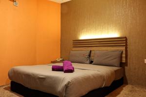 Postel nebo postele na pokoji v ubytování Classical Boutique Hotel