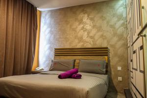Postel nebo postele na pokoji v ubytování Classical Boutique Hotel