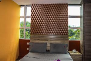 Postel nebo postele na pokoji v ubytování Classical Boutique Hotel