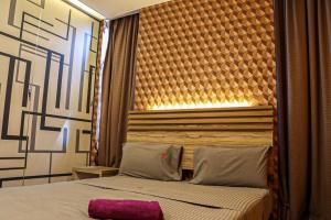 Postel nebo postele na pokoji v ubytování Classical Boutique Hotel