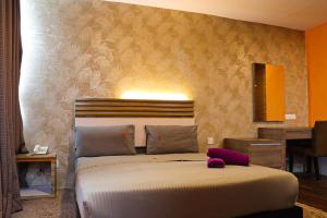 Postel nebo postele na pokoji v ubytování Classical Boutique Hotel
