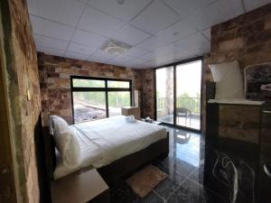 Postelja oz. postelje v sobi nastanitve Hotel Galaxy Hill Resorts Murree