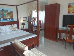 TV a/nebo společenská místnost v ubytování Ocean Breeze Resort