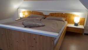 Postel nebo postele na pokoji v ubytování Biohof Kroisleitner