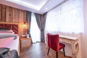 Postel nebo postele na pokoji v ubytování Villa Ambach