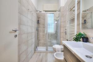 A bathroom at I Host apartment - Cossa 19