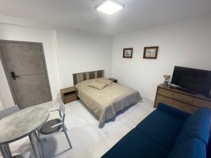 Rúm í herbergi á Apartamenty Wisła Centrum