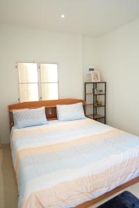 Voodi või voodid majutusasutuse Tara Resort toas