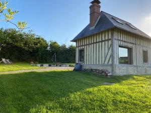 Vonkajšia záhrada v ubytovaní Maisonnette au calme, 15 kms Honfleur/Deauville