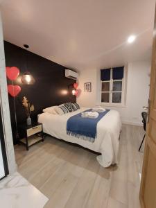 Posteľ alebo postele v izbe v ubytovaní L'incontournable - Loiret Spa