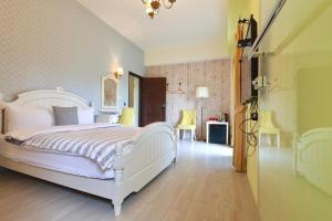 Postel nebo postele na pokoji v ubytování Taroko Mountain View B&B