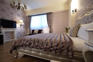 Postel nebo postele na pokoji v ubytování Taroko Mountain View B&B