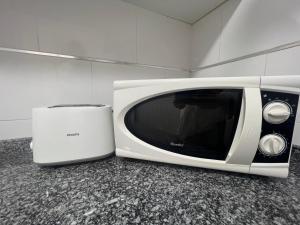 TV a/nebo společenská místnost v ubytování Central Prívate Room Valencia