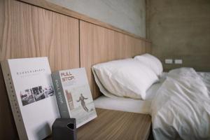 Katil atau katil-katil dalam bilik di 威世紀行旅