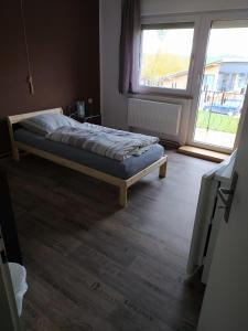 Postel nebo postele na pokoji v ubytování Ferienhaus Günter