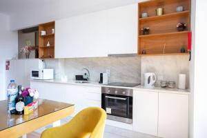 A cozinha ou cozinha compacta de Valentino Loft Porto Center - by Guest SPA