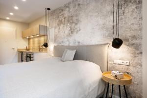 Katil atau katil-katil dalam bilik di My Suite Leesch - Hotel & Restaurant nahe Büsum - Hunde herzlich willkommen