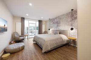Katil atau katil-katil dalam bilik di My Suite Leesch - Hotel & Restaurant nahe Büsum - Hunde herzlich willkommen