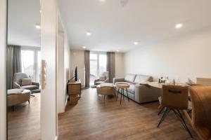 Ruang duduk di My Suite Leesch - Hotel & Restaurant nahe Büsum - Hunde herzlich willkommen