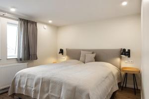 Katil atau katil-katil dalam bilik di My Suite Leesch - Hotel & Restaurant nahe Büsum - Hunde herzlich willkommen