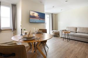Ruang duduk di My Suite Leesch - Hotel & Restaurant nahe Büsum - Hunde herzlich willkommen
