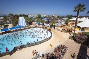 a crowd of people in a pool at an amusement park at Nice - Paillon apartment by Stay in the heart of ... in Nice