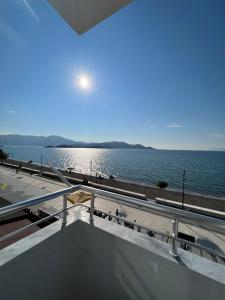 a view of the ocean from the balcony of a house at Ibrahim Bey Hotel in Fethiye