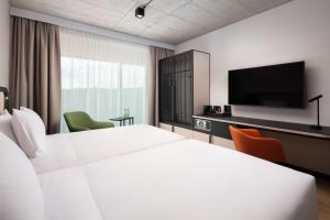 Telewizja i/lub zestaw kina domowego w obiekcie Hyatt Place Krakow