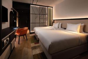 Łóżko lub łóżka w pokoju w obiekcie Hyatt Place Krakow