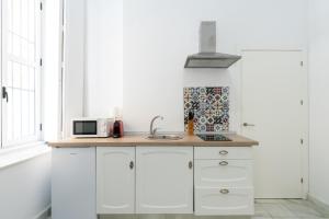 Kuchyň nebo kuchyňský kout v ubytování OleHousing-San Lorenzo