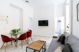 TV a/nebo společenská místnost v ubytování OleHousing-San Lorenzo