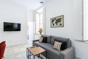TV a/nebo společenská místnost v ubytování OleHousing-San Lorenzo