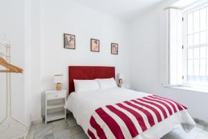 Postel nebo postele na pokoji v ubytování OleHousing-San Lorenzo