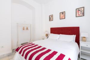 Postel nebo postele na pokoji v ubytování OleHousing-San Lorenzo