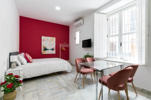 Postel nebo postele na pokoji v ubytování OleHousing-San Lorenzo