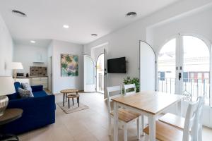 TV a/nebo společenská místnost v ubytování OleHousing-San Lorenzo