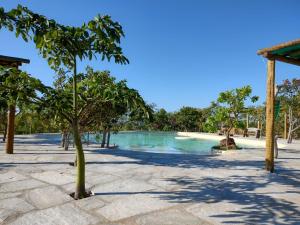 a pool at the resort at Pousada Refúgio da Serra in Pirenópolis