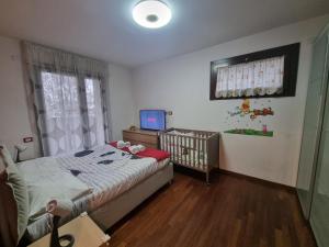 En eller flere senge i et værelse på AMA Milano Intero appartamento Bicocca Zona 9