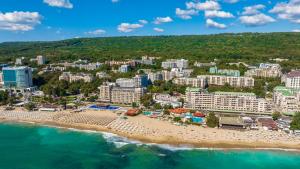 an aerial view of a beach in a resort at Prestige Hotel and Aquapark - All inclusive in Golden Sands