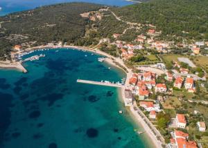 an aerial view of a beach with a harbor at Holiday home in Vidovici - Insel Cres 43064 in Vidović