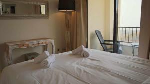 Posteľ alebo postele v izbe v ubytovaní Marbella Resort, Samara By Houselogy