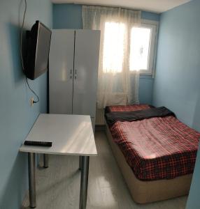 Säng eller sängar i ett rum på Golden Halich Hostel