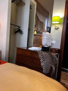 Postel nebo postele na pokoji v ubytování LU Suites