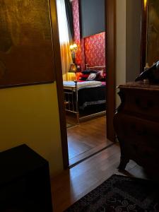 Postel nebo postele na pokoji v ubytování LU Suites