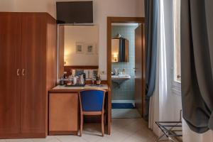 Postel nebo postele na pokoji v ubytování Hotel Bonifacio